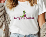 "Sorry I'm Booked" design on a white unisex t-shirt