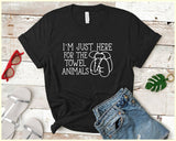 "I'm Just Here For The Towel Animals" design on a black unisex t-shirt
