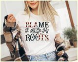 "Blame It All On My Roots" design on a unisex t-shirt