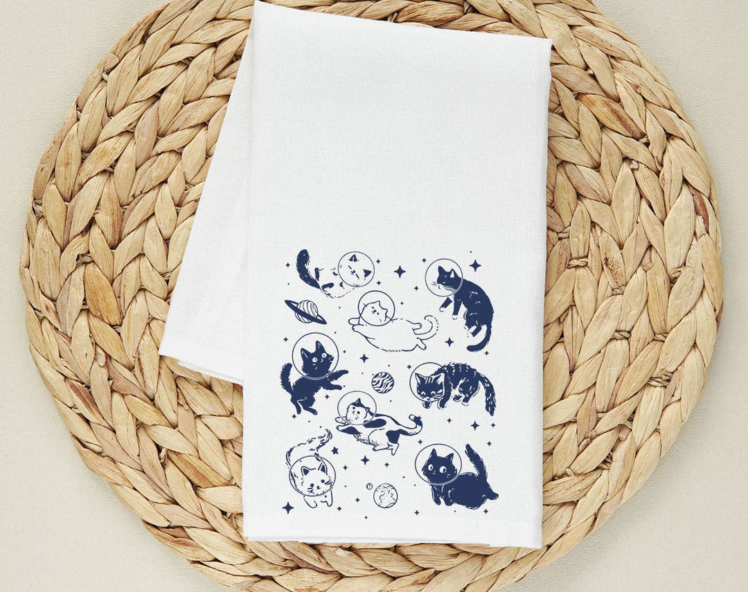 "Cats Floating In Space" design on a white 28 x 28 inch flour sack tea towel