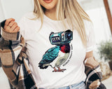 "Birds Aren't Real" design on a white unisex t-shirt