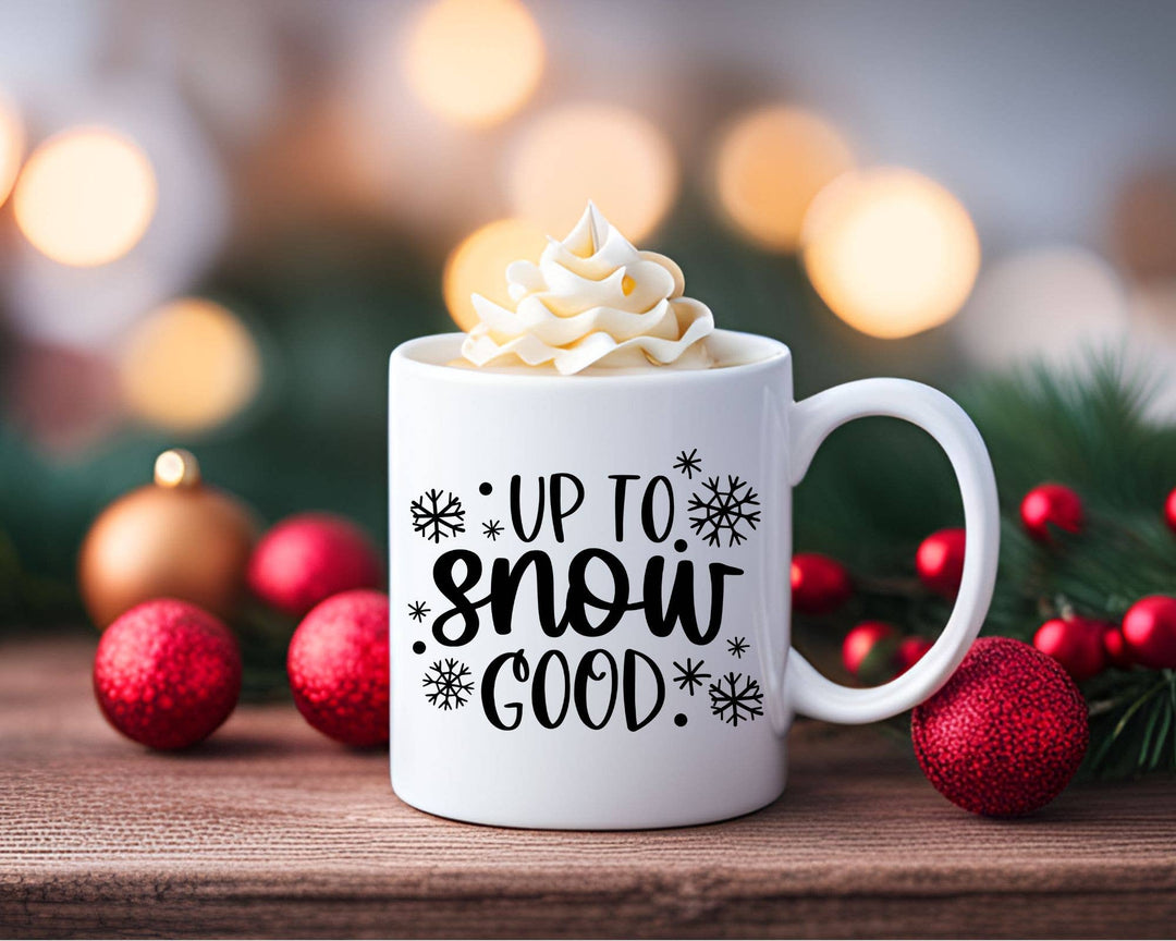 "Up To Snow Good" Christmas design on a white coffee mug