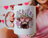"Easter Highland Cow" design on a white ceramic coffee mug
