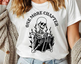 "One More Chapter Skeleton" design on a white unisex t-shirt