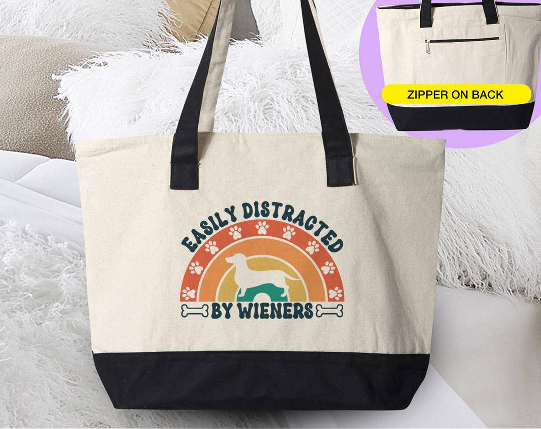 "Easily Distracted By Wieners" design on a natural canvas zippered tote bag
