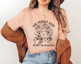 "The Female Gaze" design on a peach unisex t-shirt
