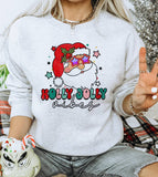"Holly Jolly Vibes" design on an ash gray unisex crewneck sweatshirt