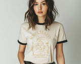"Suriel Tea Co Court Of Thorns" design on a natural ringer t-shirt with black contrast trim