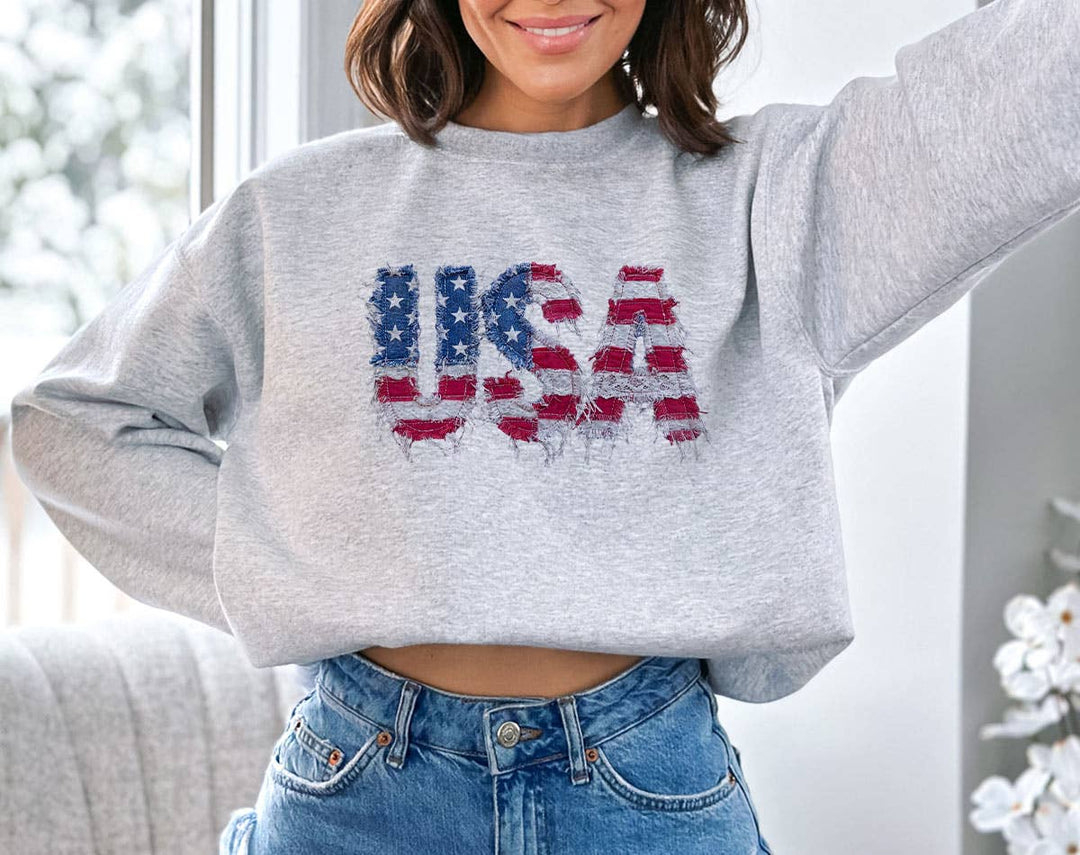 "USA Faux Patchwork" design on an ash gray unisex crewneck sweatshirt