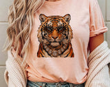"Glam Tiger Leopard" design on a peach unisex t-shirt