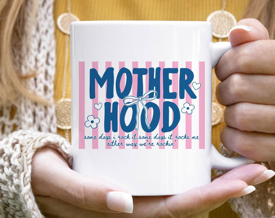 "Motherhood Some Days I Rock It" design on a white ceramic coffee mug