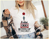 "Running Up That Hill" design on a white unisex t-shirt