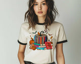 "A Court Of Roses Pumpkin Book" design on a natural ringer t-shirt with black contrast trim