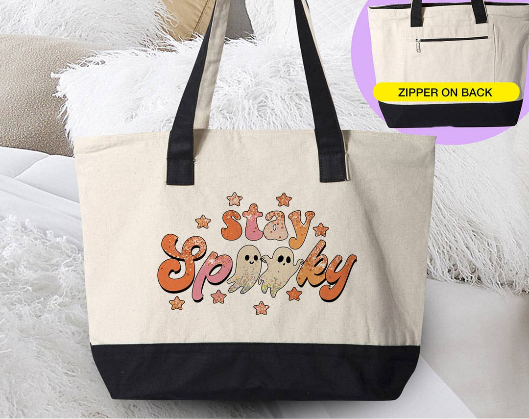 "Stay Spooky" design on a natural canvas zippered tote bag