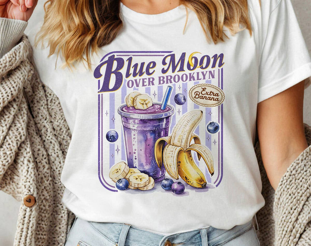 "Blue Moon Over Brooklyn Heated Rivalry" design on a white unisex t-shirt