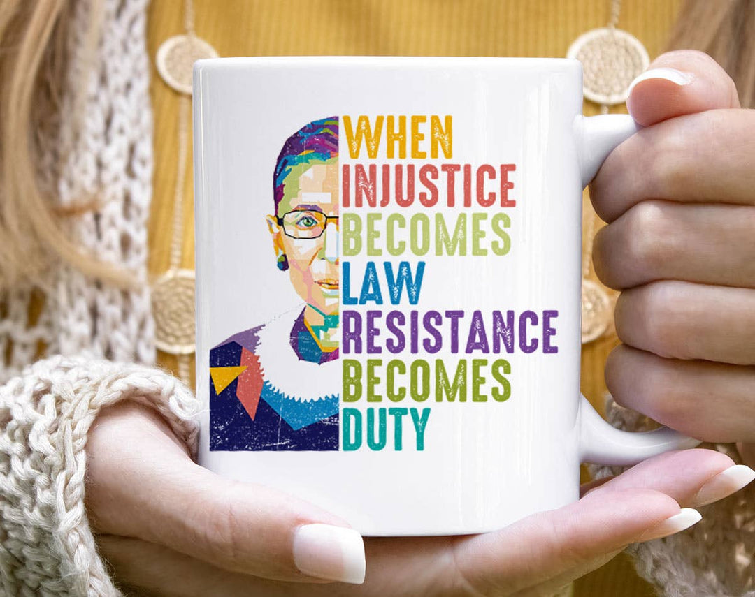 "When Injustice Becomes Law" design on a white ceramic coffee mug
