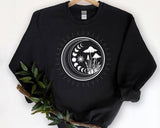 "Magic Mushroom" design on a black unisex crewneck sweatshirt