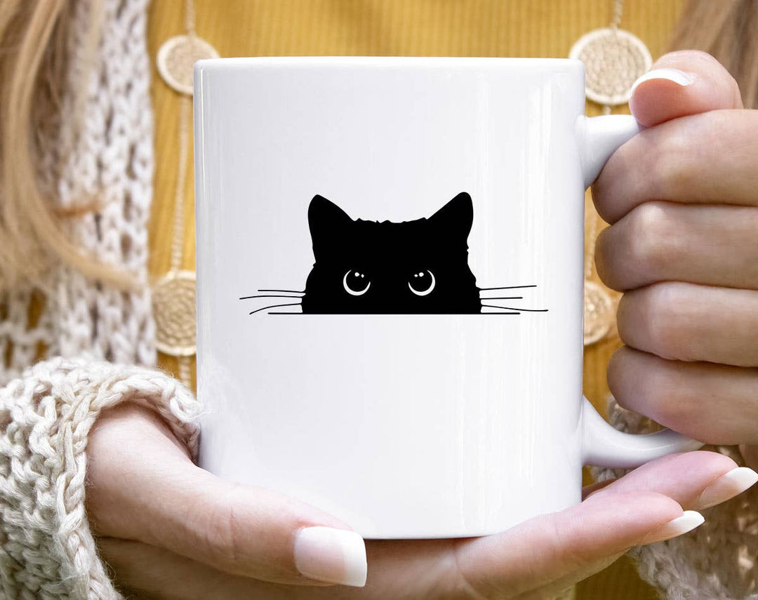 "Cat Peaking" design on a white ceramic coffee mug