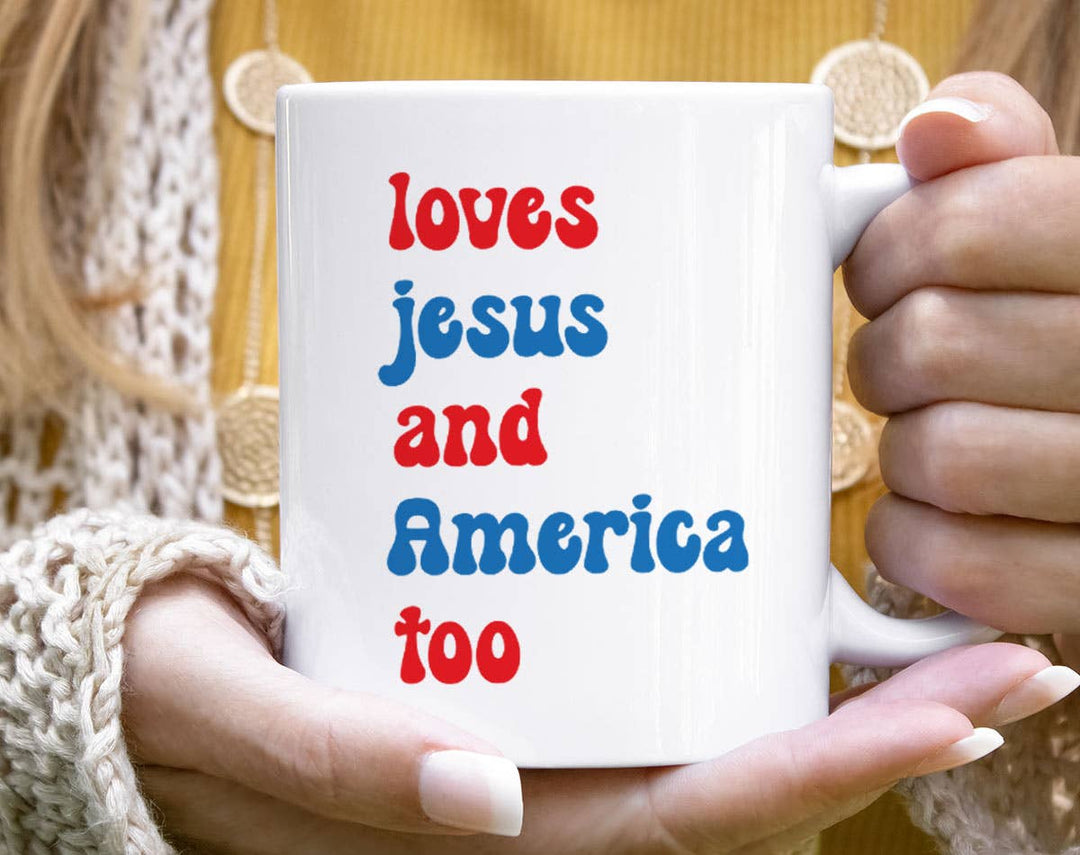 "4th of July Loves Jesus and America too" design on a white ceramic coffee mug