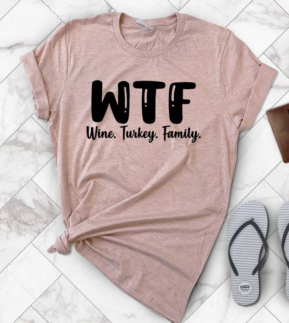 "WTF Wine Turkey Family" design on a peach unisex t-shirt