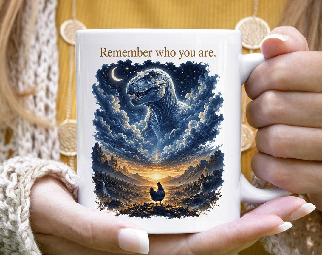 "Remember Who You Are T-Rex Chicken Evolution" design on a white ceramic coffee mug