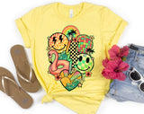 "Summer Pink Flamingo" design on a pale yellow unisex t-shirt