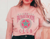 "The Homebody Club" design on a peach unisex t-shirt