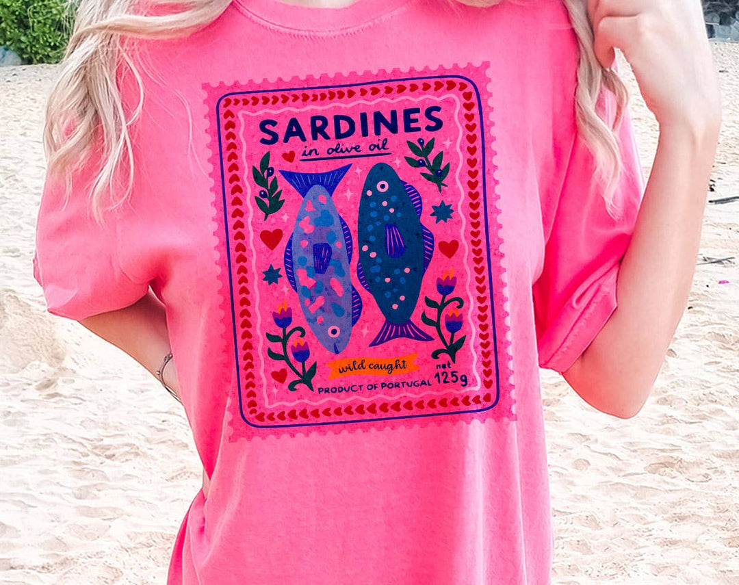 "Sardines Purple Stamp" design on a pink watermelon Comfort Colors t-shirt