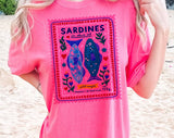 "Sardines Purple Stamp" design on a pink watermelon Comfort Colors t-shirt