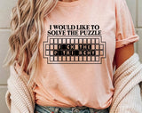 "Solve The Puzzle F*ck The Patriarchy" design on a peach unisex t-shirt