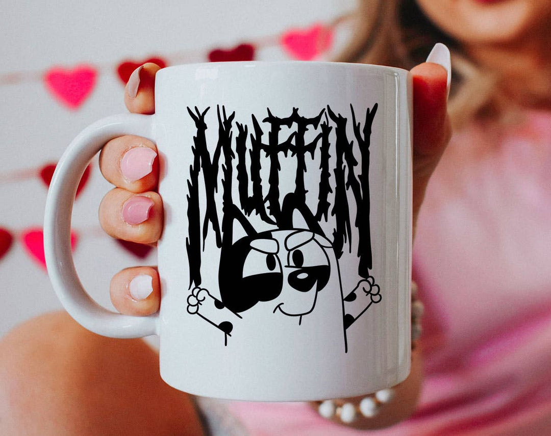 "Muffin Metal" design on a white ceramic coffee mug