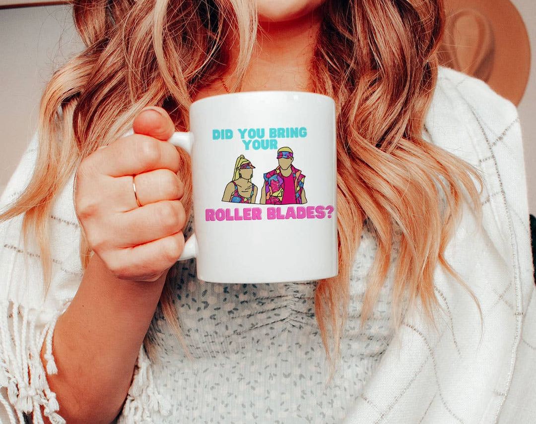 "Bring Your Rollerblades" design on a white ceramic coffee mug