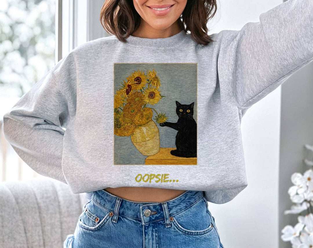 "Oopsie Van Gogh Sunflowers Black Cat" design on an ash gray unisex crewneck sweatshirt
