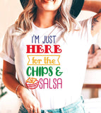 "I'm Just Here For The Chips" design on a white unisex t-shirt