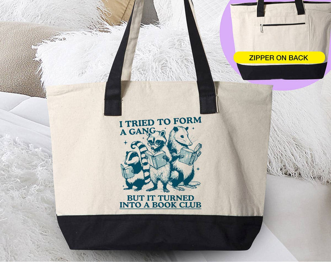 "I Tried To Form A Gang Book Club" design on a natural canvas zippered tote bag