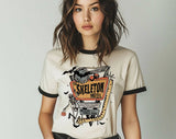 "The Skeleton Motel" design on a natural ringer t-shirt with black contrast trim