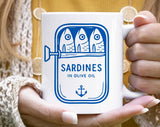 "Sardines Blue Tin Fish" design on a white ceramic coffee mug