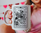 "The Plant Lover Tarot Black & White" design on a white ceramic coffee mug