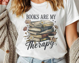 "Books Are My Therapy Flowers" design on a white unisex t-shirt