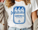 "Sardines Blue Tin" design on a white unisex t-shirt