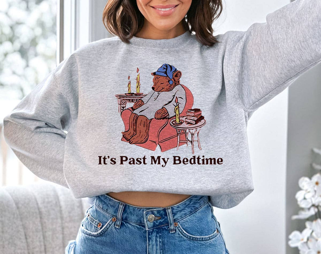"It's Past My Bedtime Bear" design on an ash gray unisex crewneck sweatshirt