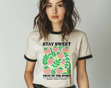 "Stay Sweet Strawberries" design on a natural ringer t-shirt with black contrast trim