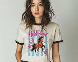 "Hold Your Horses" design on a natural ringer t-shirt with black contrast trim