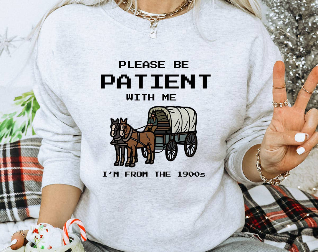 "Please Be Patient, I'm From The 1900's" design on an ash gray unisex crewneck sweatshirt