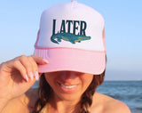 "Later Alligator" design on a mesh-back snapback trucker hat