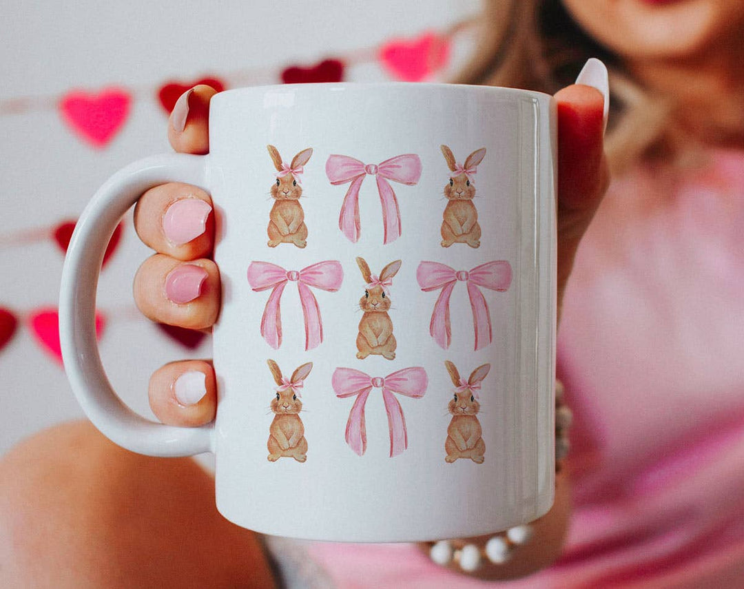 "Coquette Bunny" design on a white ceramic coffee mug