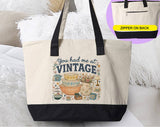 "You Had Me At Vintage Thrifting" design on a natural canvas zippered tote bag