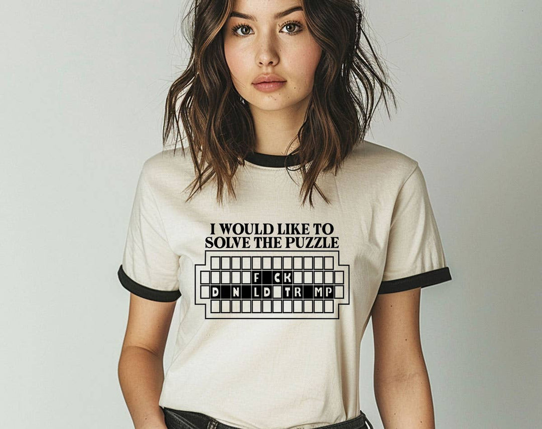 "Solve The Puzzle F*ck Trump" design on a natural ringer t-shirt with black contrast trim