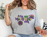 "In My Mardi Gras Era" design on a heather gray unisex t-shirt