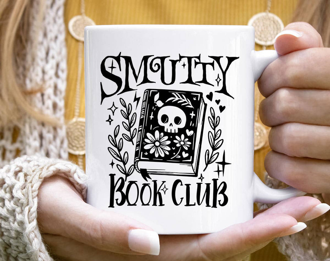"Smutty Book Club" design on a white ceramic coffee mug